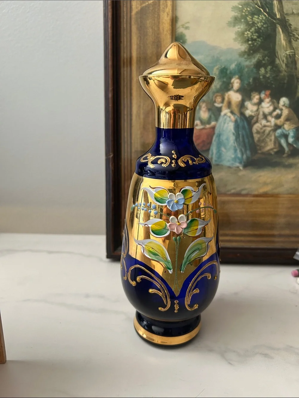 Cobalt Blue and  24 k Gold inlay  Glass pitcher with Hand-Painted Floral Motif